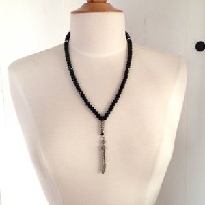 Beaded necklace with silver tassel